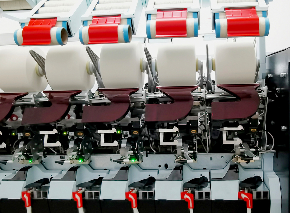 Saurer AutoBD rotor spinning machine with Synchrodoffing FX