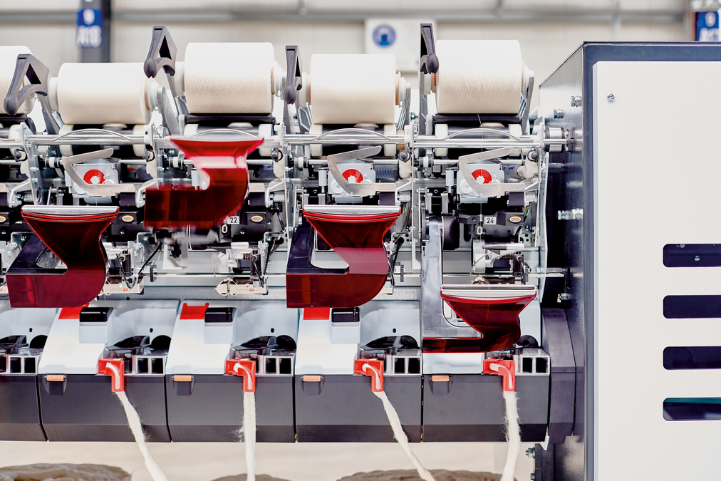 Saurer AutoBD rotor spinning machine with SynchroPiecing