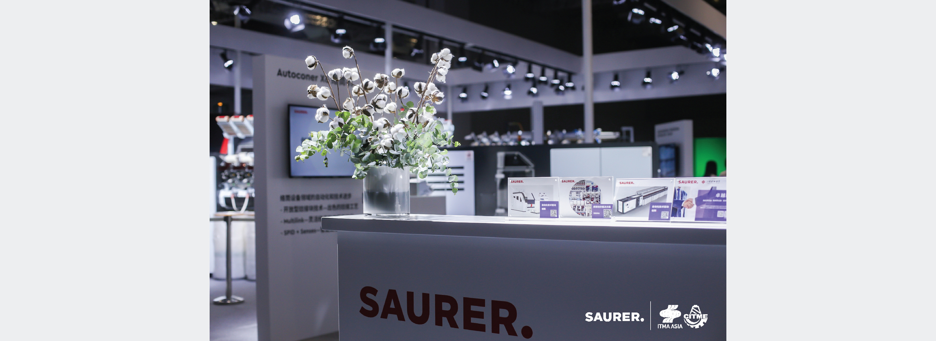Saurer ITMA Asia counter with cotton plant