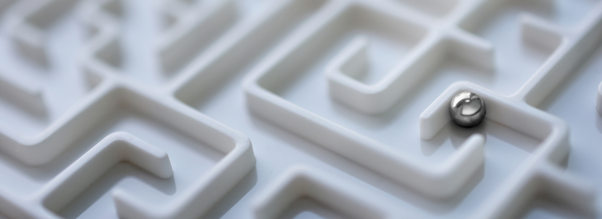 White maze with silver ball