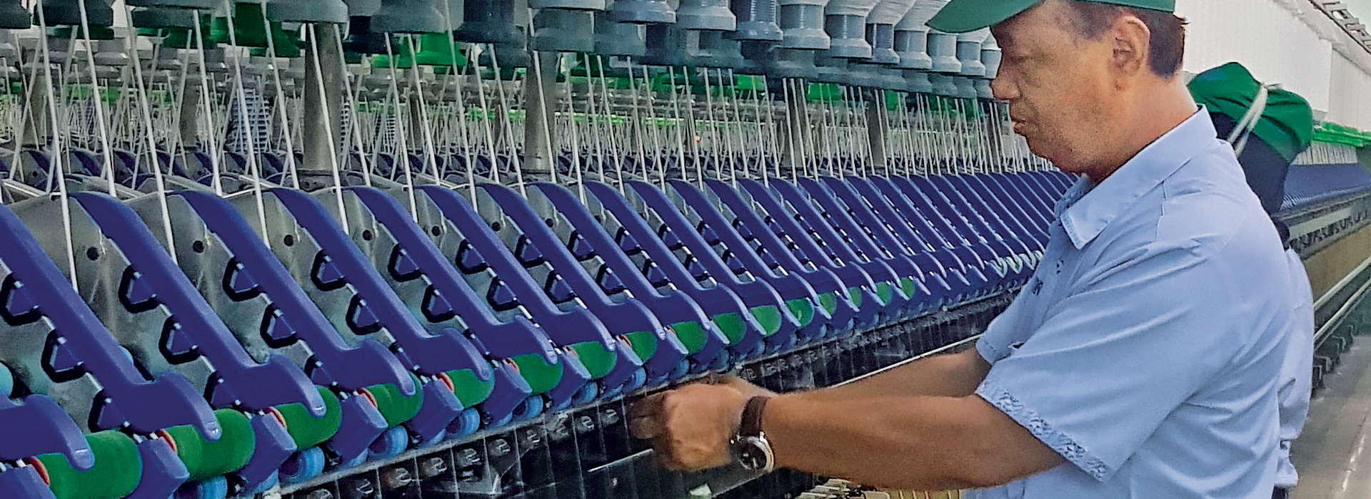 Factory manager Mr Djoko Sungkono operating the Saurer PK 2630 SEH weighting arm