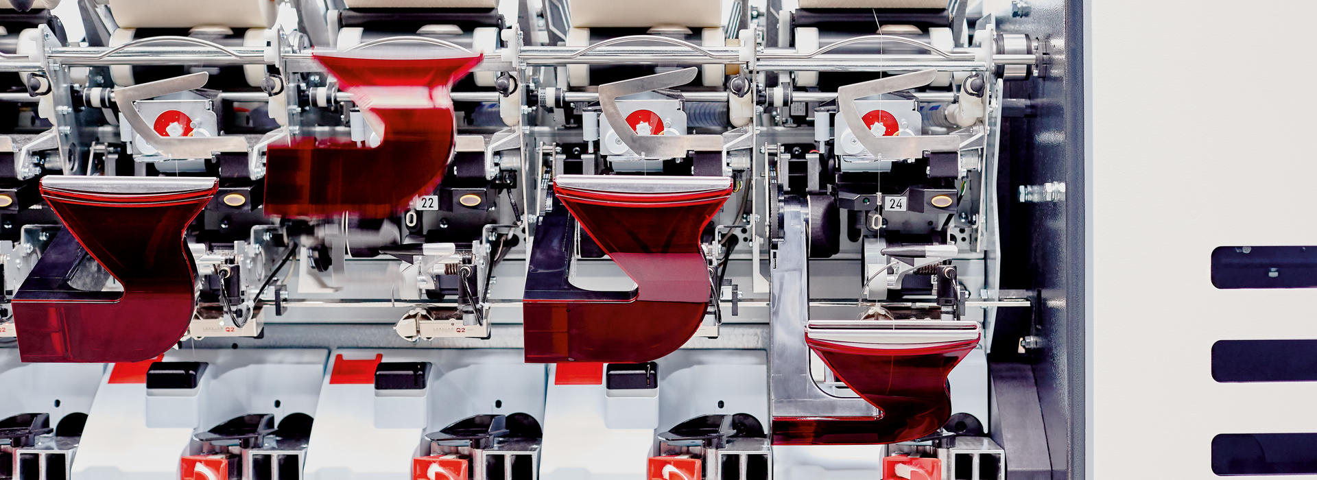 Saurer AutoBD rotor spinning machine with Synchropiecing