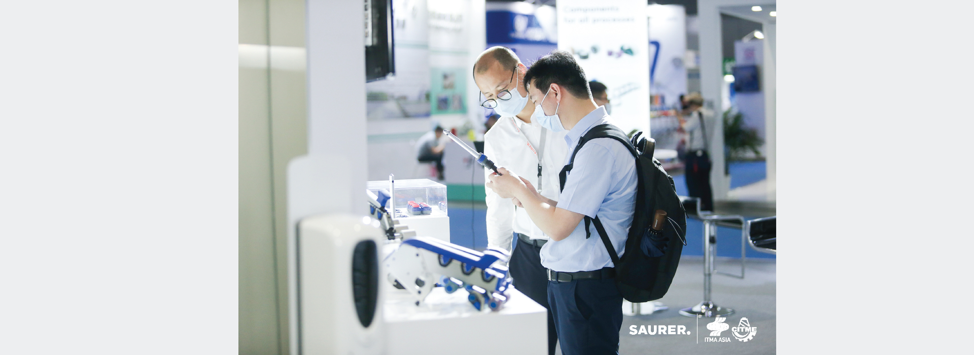 Saurer ITMA Asia visitors with Texparts spindle