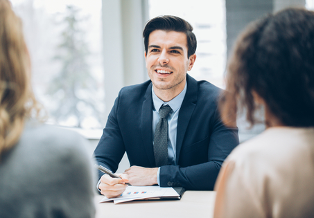 Man in interview with two women