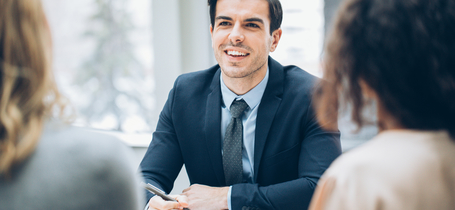 Man in interview with two women