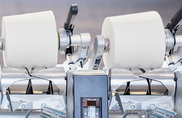 Autoconer: 1-2 % mehr Spuleninhalt dank größerer Verlegebreite.